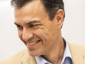 Spain's Prime Minister Pedro Sanchez smiles during a party meeting at Socialist party headquarters in Madrid, Spain, Monday, April 29, 2019. Spain's political future is no clearer after a third election since 2015, with experts saying Monday that it won't be anytime soon before the muddle is resolved. The incumbent prime minister, Pedro Sanchez, celebrated after his Socialist party won the most votes in Sunday's ballot. But Spanish politicians were doing the math on how Sanchez might survive the next four years without a parliamentary majority.