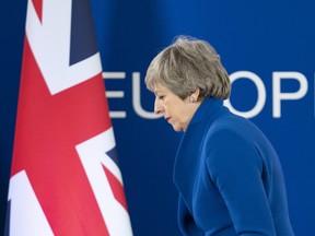 Theresa May, U.K. prime minister, leaves a news conference following a European Union leaders summit in the Europa building in Brussels, Belgium, early on Thursday, April 11, 2019.