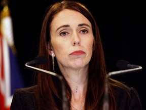 FILE - In this March 25, 2019, file photo, New Zealand Prime Minister Jacinda Ardern addresses a press conference in Wellington, New Zealand. Ardern has named a Supreme Court justice to head New Zealand's top-level investigation into the actions of security agencies and other issues related to the mosque shootings.