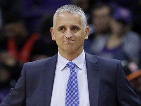 FILE - In this Jan. 24, 2019, file photo, Phoenix Suns head coach Igor Kokoskov watches during the second half of an NBA basketball game against the Portland Trail Blazers. The Suns say they have fired Kokoskov after one season.