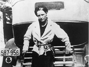 Bonnie Parker poses in a stylish jacket cinched with firepower.