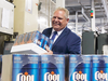 Ontario Premier Doug Ford promotes his “buck a beer” policy at a brewery in Etobicoke on Aug. 27, 2018.