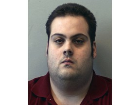 FILE - This booking photo released Thursday, March 1, 2018, by the Beverly Police Department shows Daniel Frisiello, of Beverly, Mass., accused of mailing five envelopes containing a white powder. Prosecutors are seeking three years in prison for Frisiello who admitted to sending threatening letters filled with white powder to President Donald Trump's sons and others. Frisiello is set to be sentenced Friday, April 19, 2019, in Boston federal court. (Beverly Police Department via AP, File)