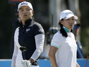 Jin Young Ko, left, of South Korea, watches her ball from the sixth tee with In-Kyung Kim, of South Korea, during the final round of the LPGA Tour ANA Inspiration golf tournament at Mission Hills Country Club in Rancho Mirage, Calif., Sunday, April 7, 2019.