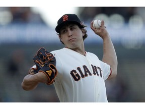 San Francisco Giants pitcher Derek Holland works against the San Diego Padres during the first inning of a baseball game Tuesday, April 9, 2019, in San Francisco.