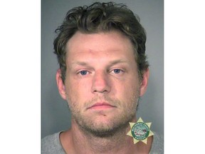 FILE - This undated file photo provided by the Multnomah County Sheriff's office shows Russell Courtier. The white supremacist who ran down and killed a young black man in Oregon two years ago was sentenced Tuesday, April 16, 2019, to life in prison without the possibility of parole for 28 years. Courtier's sentencing came after jurors in March found Courtier, 40, guilty of murder, hit-and-run driving and the hate crime of second-degree intimidation in the death of 19-year-old Larnell Bruce, The Oregonian/OregonLive reported.