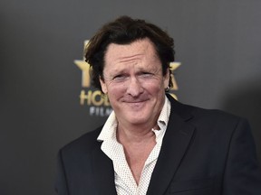 FILE - In this Nov. 1, 2015 file photo, Michael Madsen arrives at the Hollywood Film Awards at the Beverly Hilton Hotel in Beverly Hills, Calif. Prosecutors have charged Madsen with two misdemeanor counts of drunken driving after the actor drove his SUV into a pole on March 24, 2019. Madsen has not entered a plea, and is scheduled to appear in court May 20.