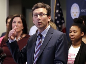FILE - In this Feb. 25, 2019 file photo, Washington state Attorney General Bob Ferguson speaks at a news conference announcing a lawsuit challenging the Trump administration's Title X "gag rule" in Seattle. A federal judge in Washington state on Thursday, April 25, 2019, will hear arguments in two cases against new Trump administration rules that could cut off federal funding for health care providers who refer patients for an abortion.
