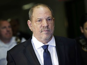 FILE - In this Oct. 11, 2018 file photo, Harvey Weinstein enters State Supreme Court in New York. An important pretrial hearing in Weinstein's sexual assault case could be play out in secret if a judge rules against news organizations fighting to keep the courtroom open. Both the prosecution and defense have asked that the hearing Friday, April 26, 2019, dealing with trial strategy and potential witnesses be held behind closed doors.