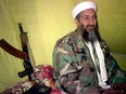Osama bin Laden with a gun