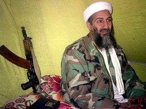 Osama bin Laden with a gun