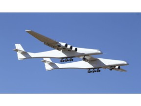 Stratolaunch, a giant six-engine aircraft with the world's longest wingspan , makes its historic first flight from the Mojave Air and Space Port in Mojave, Calif., Saturday, April 13, 2019. Founded by the late billionaire Paul G. Allen, Stratolaunch is vying to be a contender in the market for air-launching small satellites.