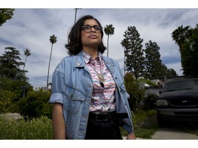 In this April 8, 2019 photo, Naia Al-Anbar stands on a street in the Glendale section of Los Angeles. Anbar, who generally supports the idea of a new category, on the 2020 census said. "The truth is we aren't ever going to be white in their eyes and we will still be discriminated against." Al-Anbar, who has a Saudi Arabian father, would mark "other" on the census if a more precise category isn't offered.