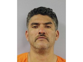FILE - This file booking photo provided by the Montgomery County Jail shows Pablo Serrano-Vitorino. Serrano-Vitorino, a Mexican national accused of killing four people in Kansas and one in Missouri in 2016 is dead after being found unresponsive in his St. Louis jail cell. Serrano-Vitorino's death was reported Tuesday, April 9, 2019 by the Montgomery County, Missouri, Sheriff's Department. The sheriff's department says Serrano-Vitorino was found unresponsive and alone in his cell at 2:02 a.m. He was pronounced dead at a hospital about an hour later. (Montgomery County Jail via AP, File)