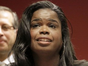 FILE - In this Dec. 2, 2015, file photo, Kim Foxx, then a candidate for Cook County state's attorney, speaks at a news conference in Chicago. Foxx, now the Cook County State's Attorney, says she hopes to begin expunging minor cannabis convictions in the coming months but acknowledges it won't be easy to implement her plan and that her office is still figuring out its scope. Foxx told the Chicago Sun-Times last week that she estimates that thousands of misdemeanor drug convictions could be wiped out. Foxx says her office is also reviewing its policy toward prosecuting those detained for selling marijuana.