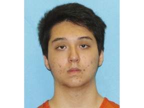 FILE - This 2018 booking file photo provided by the Collin County District Attorney's office in Texas shows Matin Azizi-Yarand, a teenager from Plano, Texas, who has been charged with criminal solicitation of capital murder and making a terroristic threat. The Collin County district attorney's office says Azizi-Yarand had planned to release a "Message to America" explaining the attack. Authorities say he spent more than $1,400 buying weapons and tactical gear, and had been trying to recruit others to help him in a planned shooting. (Collin County District Attorney's office via AP, File)