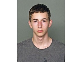 In this undated booking photo provided by the Outagamie County, Wisconsin, sheriff's office, shows 17-year-old Alexander M. Kraus, who police say has admitted he fatally shot an elderly couple he knew in eastern Wisconsin and that he was planning to cause harm at his high school. Grand Chute police told the Associated Press Monday, that police responding to a 911 call found the bodies in a Grand Chute home Sunday morning. Police say Alexander M. Kraus, of Neenah, was arrested at the house. Kraus is jailed on possible first-degree intentional homicide charges. (Outagamie County Sheriff via AP)