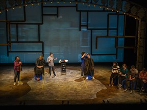 In this March 30, 2019 photo, The University of Michigan's School of Music, Theater and Dance perform "Flint" during a technical rehearsal at the Arthur Miller Theater in Ann Arbor, Mich. The new play at U of M tells the story of the Flint water crisis through the voices of residents, activists, scientists and politicians. It will premiere on Thursday, April 4, 2019, and run for two weeks.