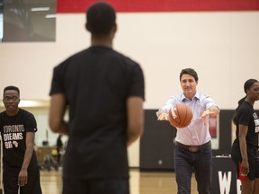 Prime Minister Justin Trudeau attends a basketball clinic with local youth, hosted by President of the Toronto Raptors Masai Ujiri in Toronto on Saturday, April 6, 2019.