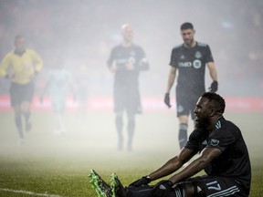 Toronto FC forward Jozy Altidore (17) recovers on the ground after being tackled during second half MLS soccer action against the Minnesota United in Toronto on Friday, April 19, 2019.