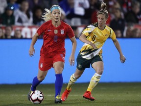 United States midfielder Julie Ertz, left, looks to pass the ball as Australia midfielder Elise Kellogg-Knight pursues during the first half of a friendly soccer match Thursday, April 4, 2019, in Commerce City, Colo.