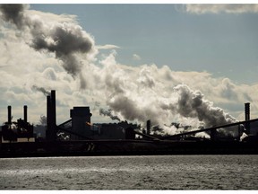 The steel mills in the Hamilton waterfront harbour are shown in Hamilton, Ont., on Tuesday, October 23, 2018. Ontario's battle against Ottawa's carbon tax gets underway in the province's top court today.