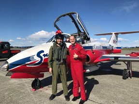 Canadian Olympic luge silver medalist Tristan Walker poses for a photo with Captain Taylor Evans of the Canadian Forces Snowbirds in this handout photo on Monday, April 29, 2019 at Canadian Forces Base Comox. The love of speed Tristan Walker inherited from his air force pilot grandfather came full circle when the luger took to the skies with the Canadian Forces Snowbirds.