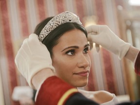 Actor Tiffany Smith as Meghan Markle is shown in a handout photo from the movie Harry & Meghan: Becoming Royal. THE CANADIAN PRESS/HO-Lifetime Canada