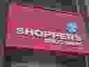 The logo for Shoppers Drug Mart is shown in downtown Toronto on May 24, 2016. Medical cannabis users in Alberta can now get their therapeutic pot from Shoppers Drug Mart, with the retail giant opening its second online platform Tuesday in the western province as it pursues the growing market.