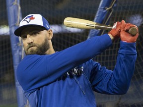 Toronto Blue Jays' Kevin Pillar takes a practice swing before stepping into the batting cage during a practice in Toronto on Wednesday, March 27, 2019, ahead of tomorrow's season opening game. The Jays have traded centre-fielder Pillar to the San Francisco Giants for right-handed pitchers Juan De Paula and Derek Law and infielder Alen Hanson.THE CANADIAN PRESS/Chris Young