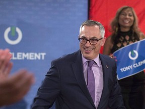 Conservative MP Tony Clement is applauded by supporters as he holds a rally in Mississauga, Ontario to announce his candidacy for the leadership of the Federal Conservative Party on July 12, 2016. MP Tony Clement says he will not seek re-election, citing a desire to continue a "better lived life." Clement was booted from the Conservative caucus after admitting to having had inappropriate online relationships with more than one woman.