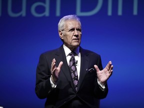 Moderator Alex Trebek speaks during a gubernatorial debate between Democratic Gov. Tom Wolf and Republican Scott Wagner in Hershey, Pa., on October 1, 2018. "Jeopardy!" host Alex Trebek says he's "feeling good" as he continues cancer therapy and is already working on the next season of the hit quiz show. In a new video posted on the "Jeopardy!" YouTube page, the Sudbury, Ont.-born TV personality is seen on the show's set, where he notes it's the last day of taping for the 35th anniversary season.