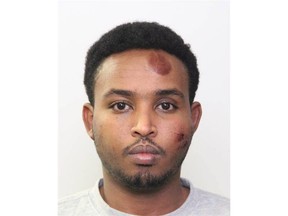 Abdulahi Hasan Sharif is shown in an Edmonton Police Service handout photo. A man accused of trying to kill an Edmonton police officer and running down pedestrians is still without a lawyer six months before his trial. Abdulahi Hasan Sharif faces 12 charges related to the 2017 attack. Sharif appeared in Court of Queen's Bench today to get a new lawyer through legal aid.