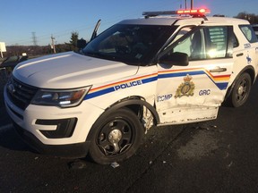 A damaged RCMP SUV is shown following a collision in Fall River, N.S., in this recent handout photo. A Nova Scotia Mountie was injured when his SUV was hit by an out-of-control motorist at the scene of a separate collision. RCMP say the officer was treated for minor injuries at hospital and released.
