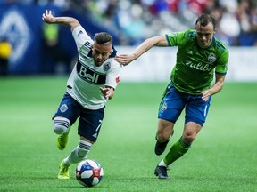 Vancouver Whitecaps' Lucas Venuto (7) plays the ball against Seattle Sounders' Brad Smith (11) during the second half MLS soccer action in Vancouver, B.C., on Saturday March 30, 2019. Last week, the Whitecaps earned their first point of the Major League Soccer season with a scoreless draw. Now the group is looking for their first victory and their next opportunity for a win will come Friday, when the 'Caps (0-3-1) host the L.A. Galaxy (3-1-0).