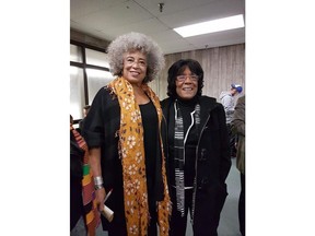 Joan Jones, right, and Angela Davis are shown in this undated handout photo. A woman who helped build the black civil rights movement in Nova Scotia is being recalled as the behind-the-scenes power in a partnership that often featured her husband as the charismatic and public voice. The daughter of Joan Jones said her mother died at a Halifax hospital on Monday night at the age of 79. Tracey Jones-Grant, the oldest of five children, said her mother's "voice and touch were on many things" out of the public eye, including the formation of early civil rights groups alongside her husband, Burnley (Rocky) Jones in the 1960s and 70s.