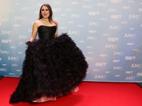 Tanya Tagaq poses on the red carpet during the 2015 Juno Awards in Hamilton, Ont., on Sunday, March 15, 2015.