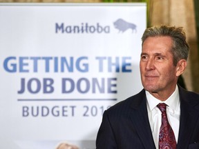 Manitoba Premier Brian Pallister speaks to media following the delivery of Manitoba's 2019 budget, at the Legislative Building in Winnipeg, Thursday, March 7, 2019.