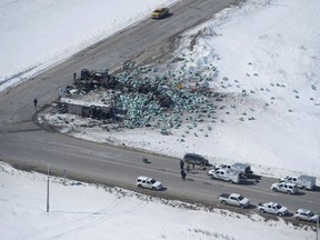 The wreckage of a fatal crash outside of Tisdale, Sask., is seen Saturday, April, 7, 2018. Saturday marks the one-year anniversary of a crash between the Humboldt Broncos junior hockey team bus and a semi-trailer that killed 16 people and injured 13 others.