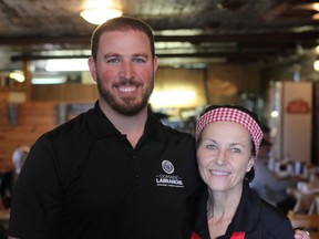 Marie-France DesGroseilliers and her son Louis pose for a photo at their family-owned sugar shack Domaine Labranche in Saint-Isidore, Quebec on Monday April 22, 2019. Fuelled by growing health and ethical concerns and culinary creativity, shifting eating habits have seen vegetarian and vegan dishes mushroom at cabanes a sucre across Quebec, along with a few pure vegan sugar shacks -- heresy in recent times.
