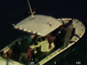 In this photo provided by the Coast Guard, a Coast Guard Air Station Miami HC-144 Ocean Sentry aircrew takes a photo of a disabled vessel that the aircrew located 210 kilometres off Mexico's Yucatan Peninsula on Sunday, April 14, 2019.