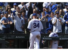 Chicago Cubs starting pitcher Jon Lester (34) leaves the game against the Pittsburgh Pirates during the third inning of a baseball game, Monday, April 8, 2019, in Chicago.