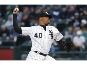 Chicago White Sox starting pitcher Reynaldo Lopez throws against the Kansas City Royals during the first inning of a baseball game, Tuesday, April 16, 2019, in Chicago.