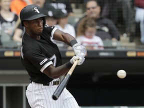 Chicago White Sox's Tim Anderson hits a two-run home run during the fourth inning of a baseball game against the Kansas City Royals in Chicago, Wednesday, April 17, 2019.