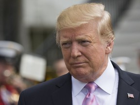 President Donald Trump walks on the South Lawn of the White House in Washington, Monday, April 22, 2019, during the annual White House Easter Egg Roll.