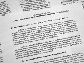 Special counsel Robert Mueller's redacted report on Russian interference in the 2016 presidential election as released on Thursday, April 18, 2019, is photographed in Washington. The section discusses Russian government links and contacts with the Trump campaign.