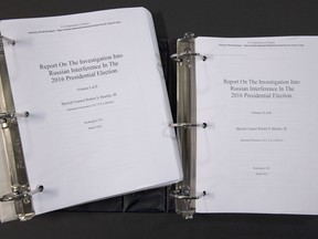 Special counsel Robert Mueller's redacted report on the investigation into Russian interference in the 2016 presidential election is photographed Thursday, April 18, 2019, in Washington. The report contained two volumes.