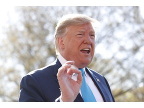 President Donald Trump speaks to members of the media on the South Lawn of the White House in Washington, before boarding Marine One helicopter, Wednesday, April 10, 2019.