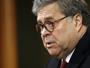 Attorney General William Barr speaks about the release of a redacted version of special counsel Robert Mueller's report during a news conference, Thursday, April 18, 2019, at the Department of Justice in Washington.