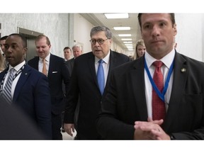 In his first appearance on Capitol Hill since taking office, and amid intense speculation over his review of special counsel Robert Mueller's Russia report, Attorney General William Barr arrives to appears before a House Appropriations subcommittee to make his Justice Department budget request, in Washington, Tuesday, April 9, 2019.